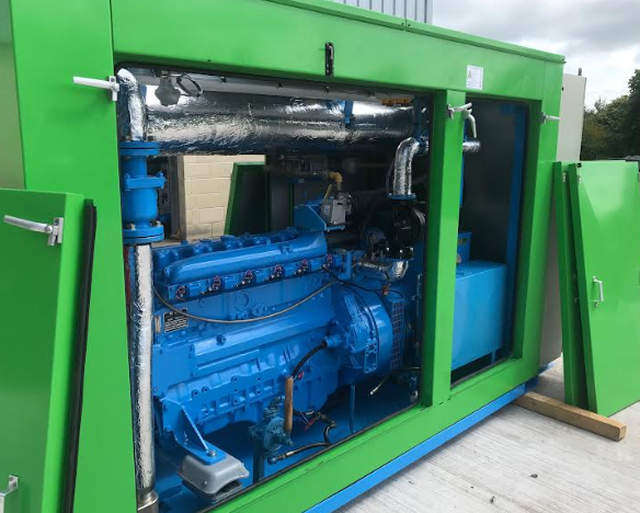 nullPhoto of MAN E2866E natural gas generator rebuilt - showing inside with alternator, gas engine, heat exchanger - second hand gas generator for sale uk