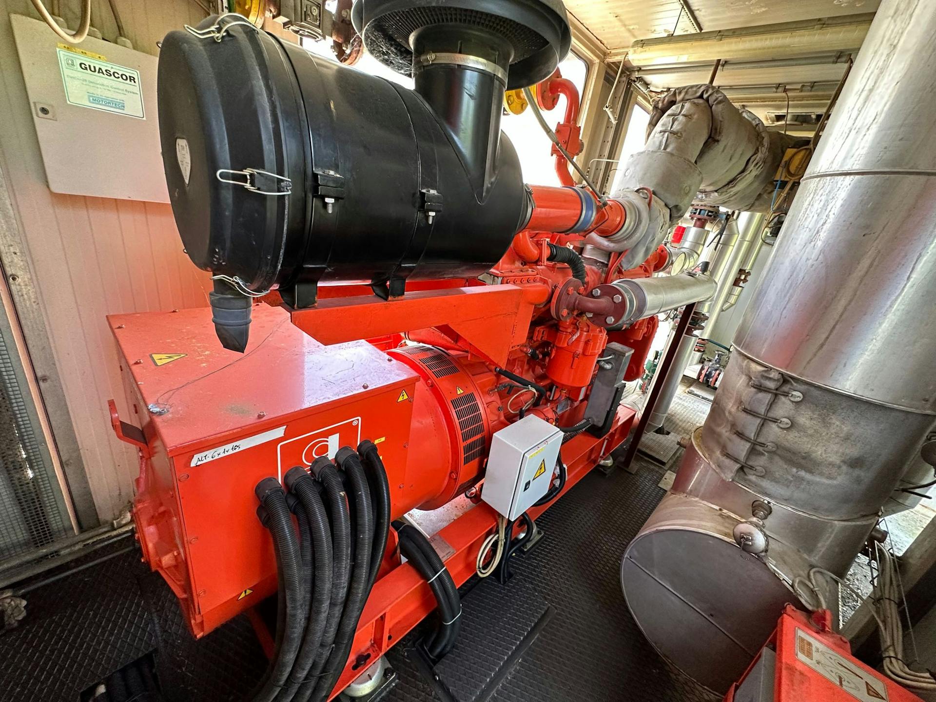 nullPhoto of Guascor FGLD180 Natural Gas Generator Set showing inside with gas engine - used genset for sale uk 
