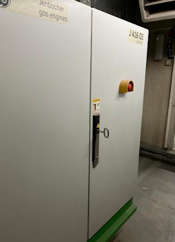 nullPhoto of Jenbacher JGS416 GS-N.L Complete Containerised Plant with Steam Boiler showing outside door of control panel - preowned gas generator for sale uk