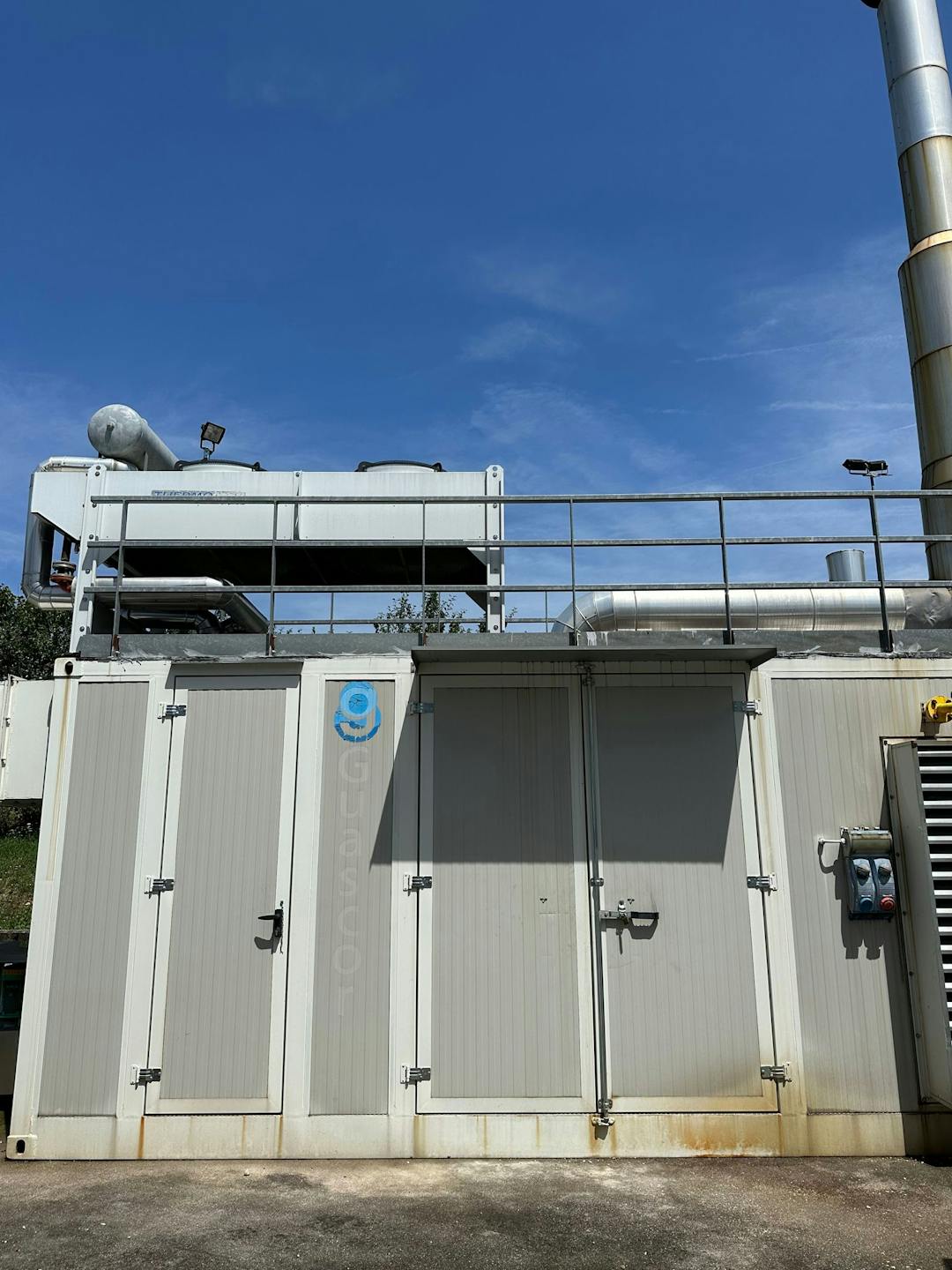 nullPhoto of Guascor FGLD180 Natural Gas Generator Set showing outside of containerized plant - preowned gas generator for sale uk